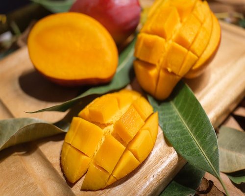 Sliced yellow tropical mango mindful portion